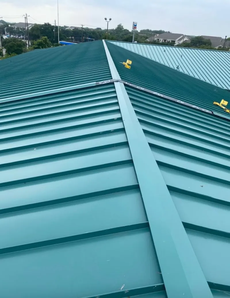 Green commercial metal roof ridge and valley for Metal Roof Repair in Snoqualmie